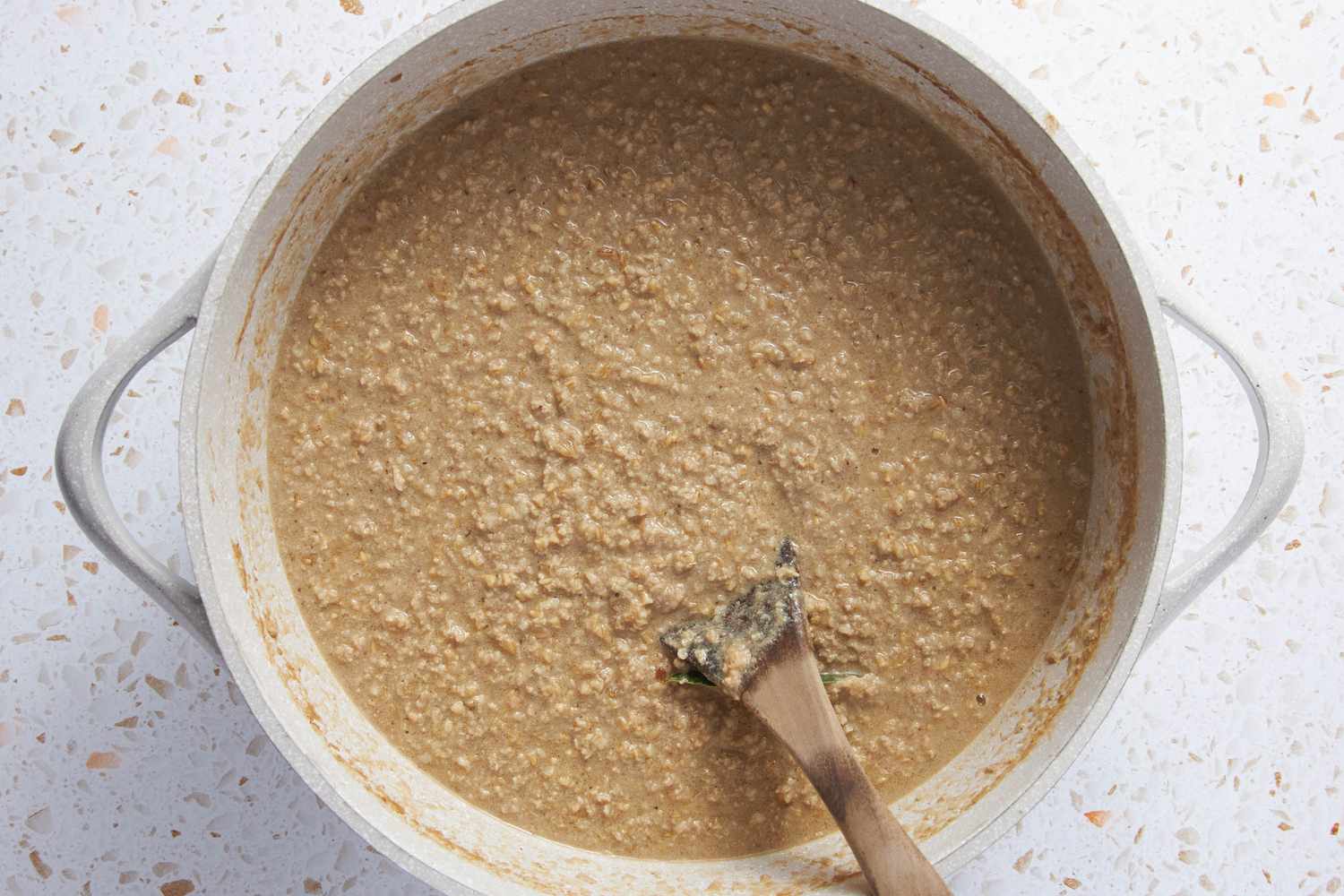 Goetta Meat Mixture Cooking in a Dutch Oven, Consistency Still Slightly Liquid-y and Loose