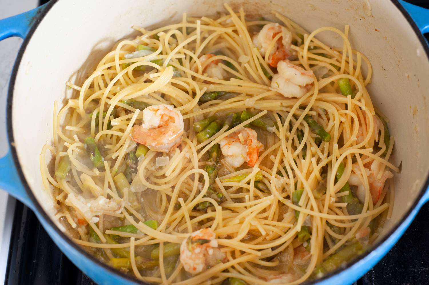 Add Pasta to Dutch Oven with Shrimp and Asparagus 