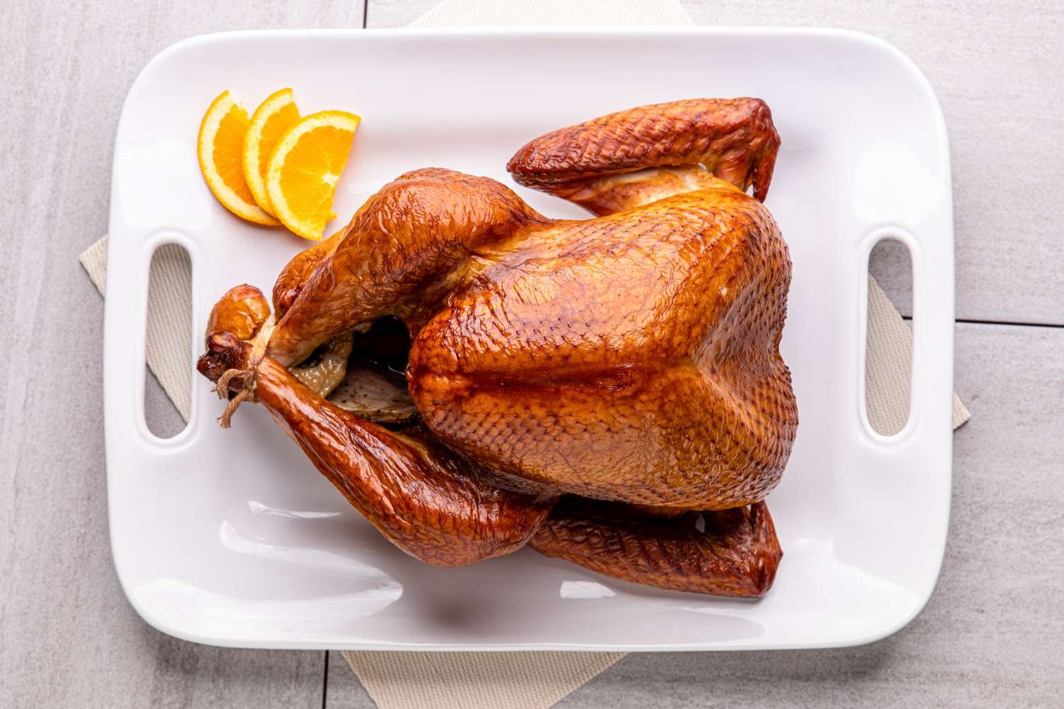Overhead view of a brined smoked turkey.