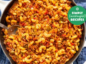 A skillet containing pasta mixed with ground meat and vegetables a labeled graphic for Simply Weeknight Recipes in one corner