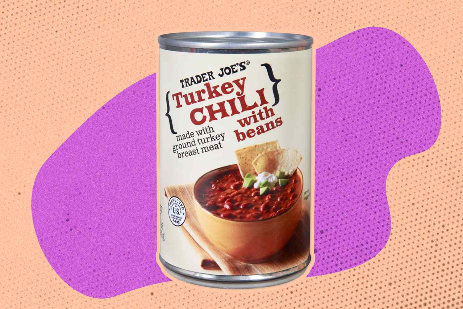 Can of Trader Joe's Turkey Chili with Beans on a purple and orange speckled background