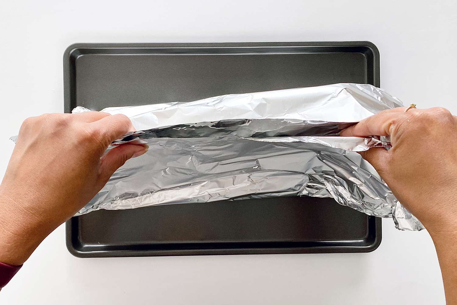 Making a foil packet to bake Garlic Butter Roasted Salmon.