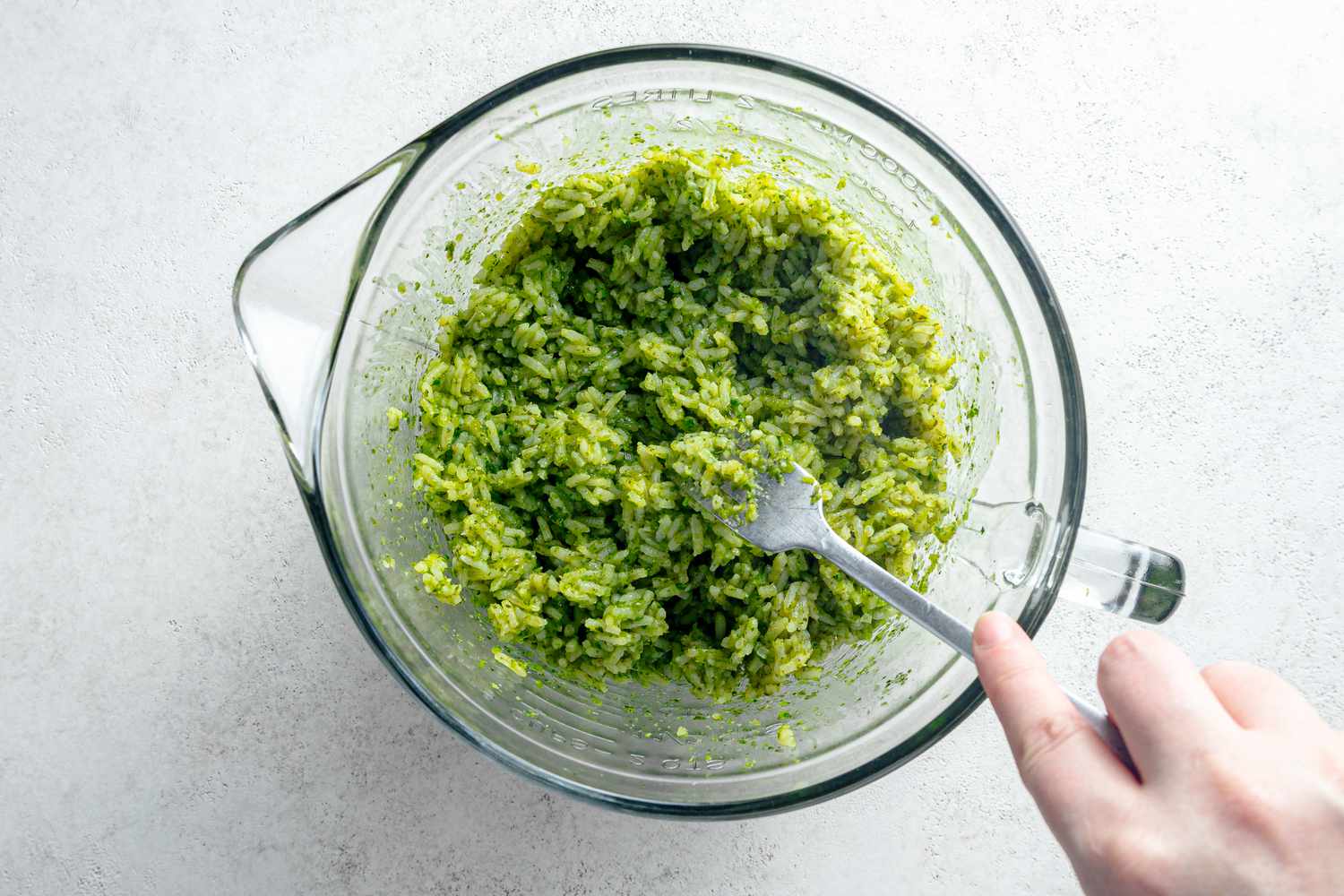 Microwave Arroz Verde Fluffed Up Using a Fork
