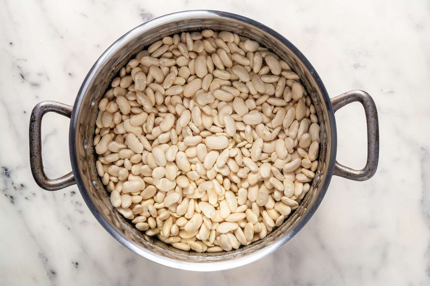 Beans soaking in pot. 