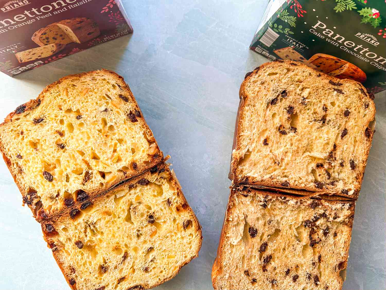 Inside of Priano Panettone Cakes from Aldi by cutting in half, one with Orange Peel and Raisins and one with Chocolate Chips