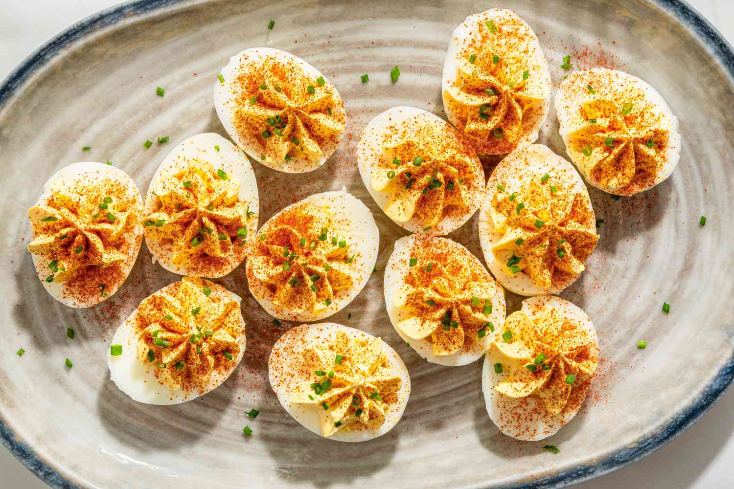 Overhead view of a plate of Alex Guarnaschelli's Deviled Eggs recipe