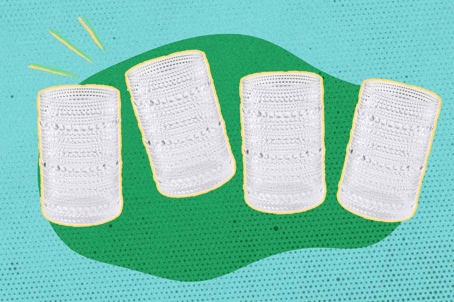 Four clear intricately patterned drinking glasses in a green and blue graphic setting