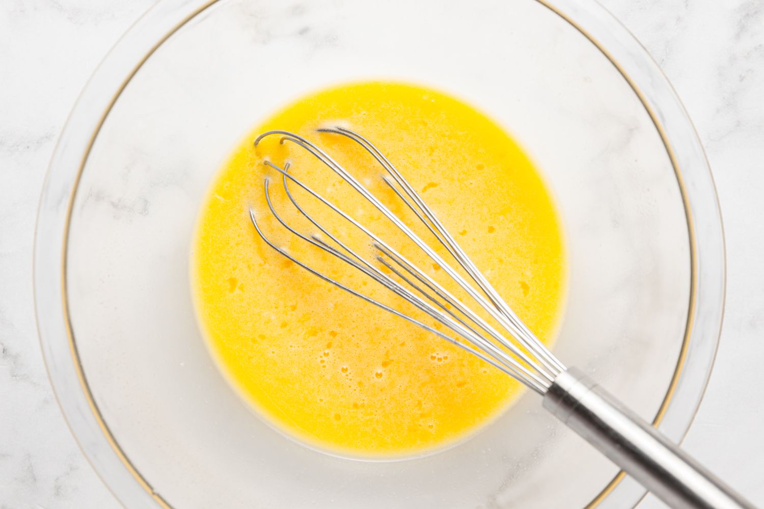 Bowl of Whisked Eggs for Motta Porrichu Recipe