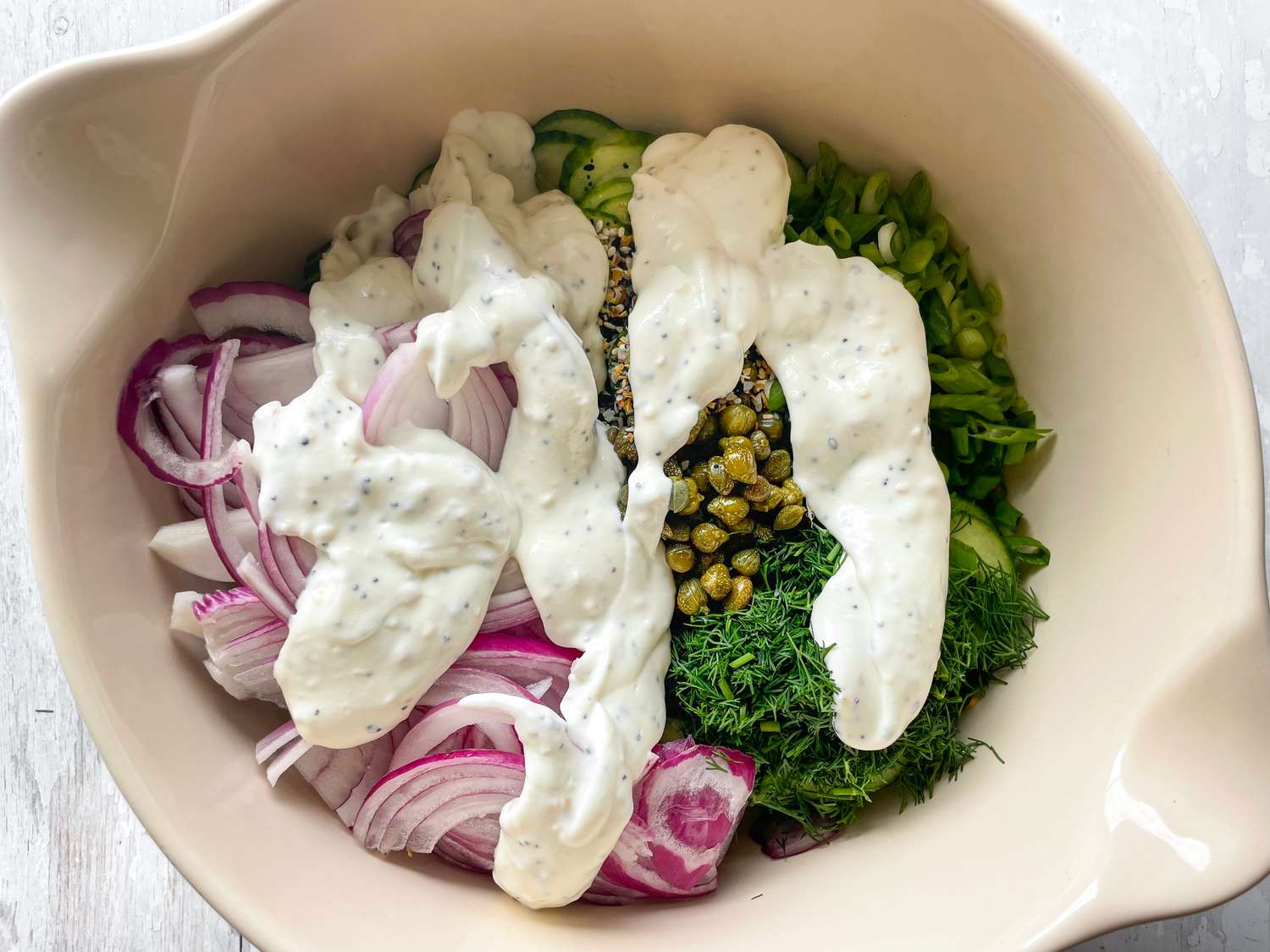 Dressing Added to Everything Bagel Cucumber Salad