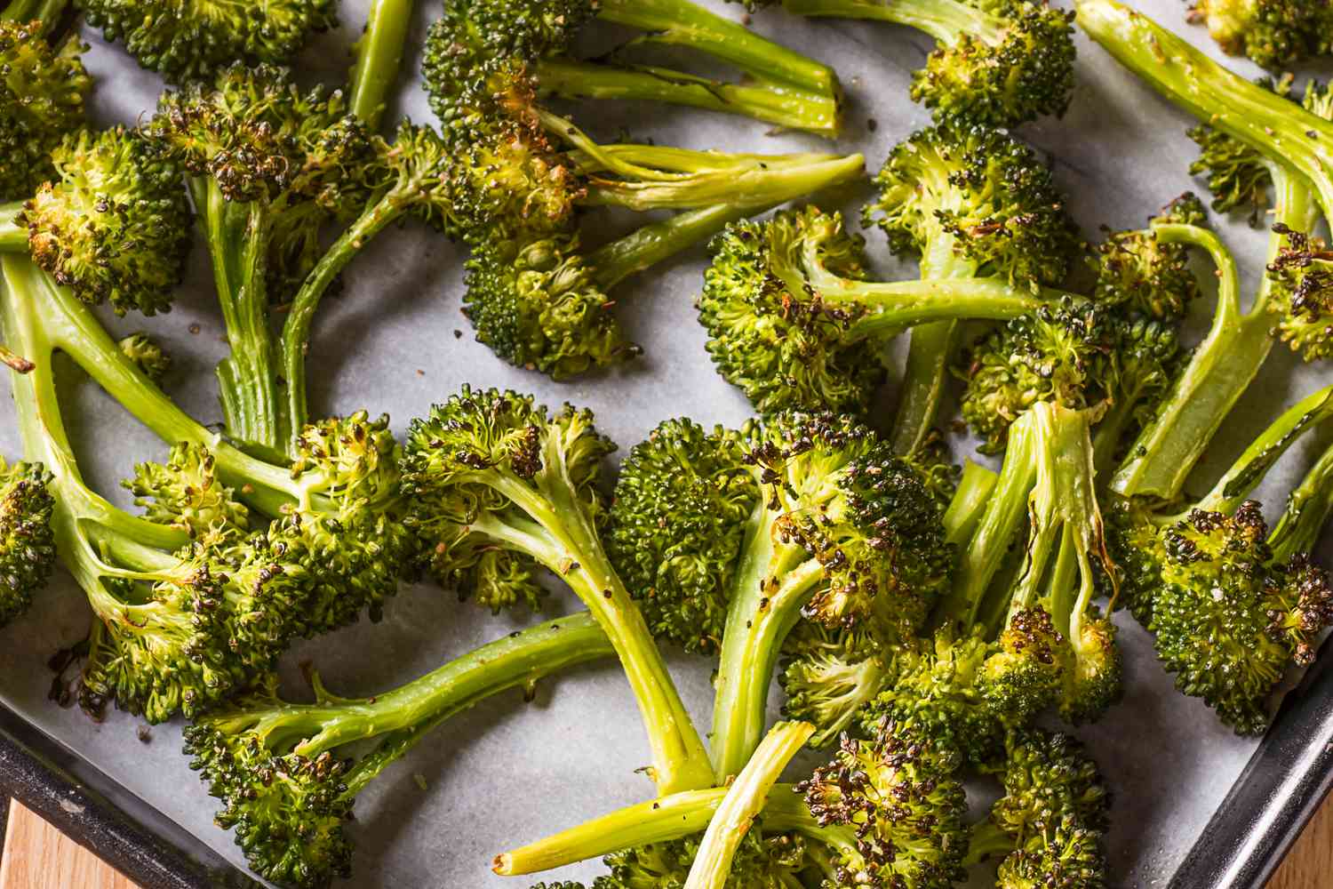 Roasted broccoli on a baking sheet