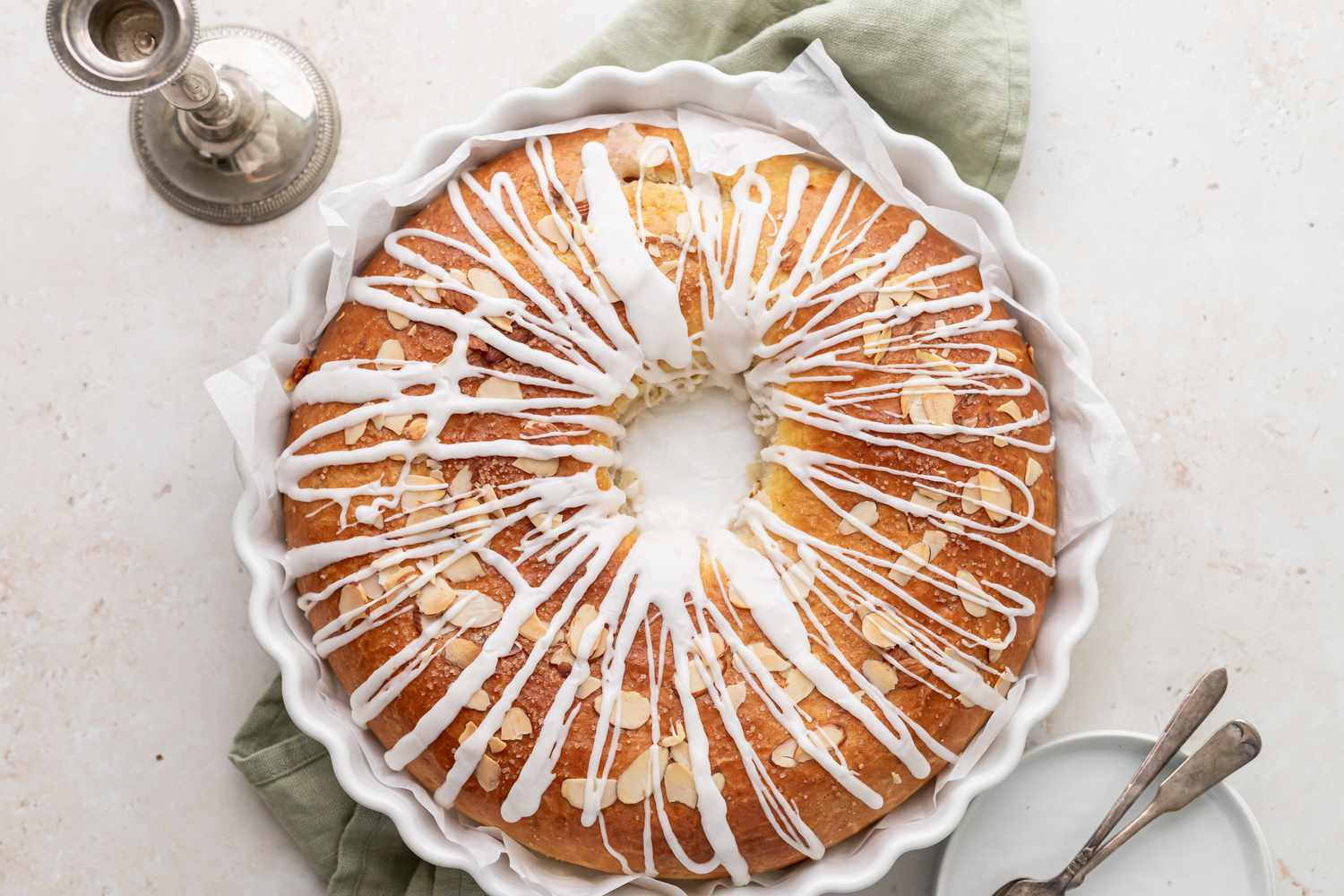 Overhead view of kringle topped with icing.