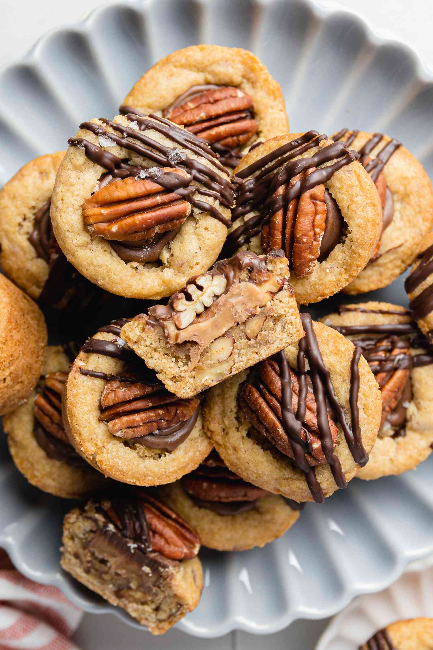 Plate with Turtle Cookie Cups with the Top Cookie Cup Cut in Half