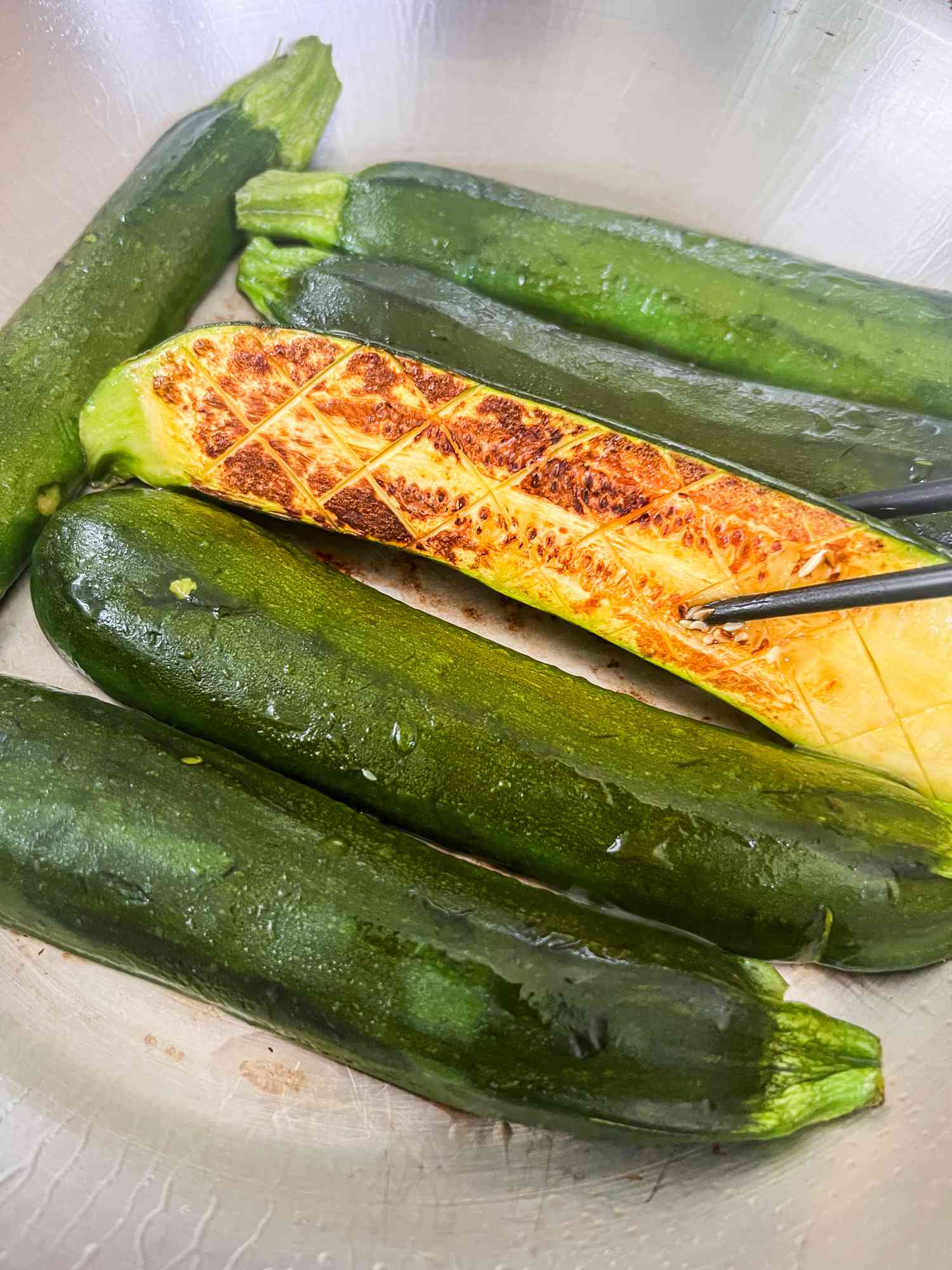 Lightly browned zucchini in skillet