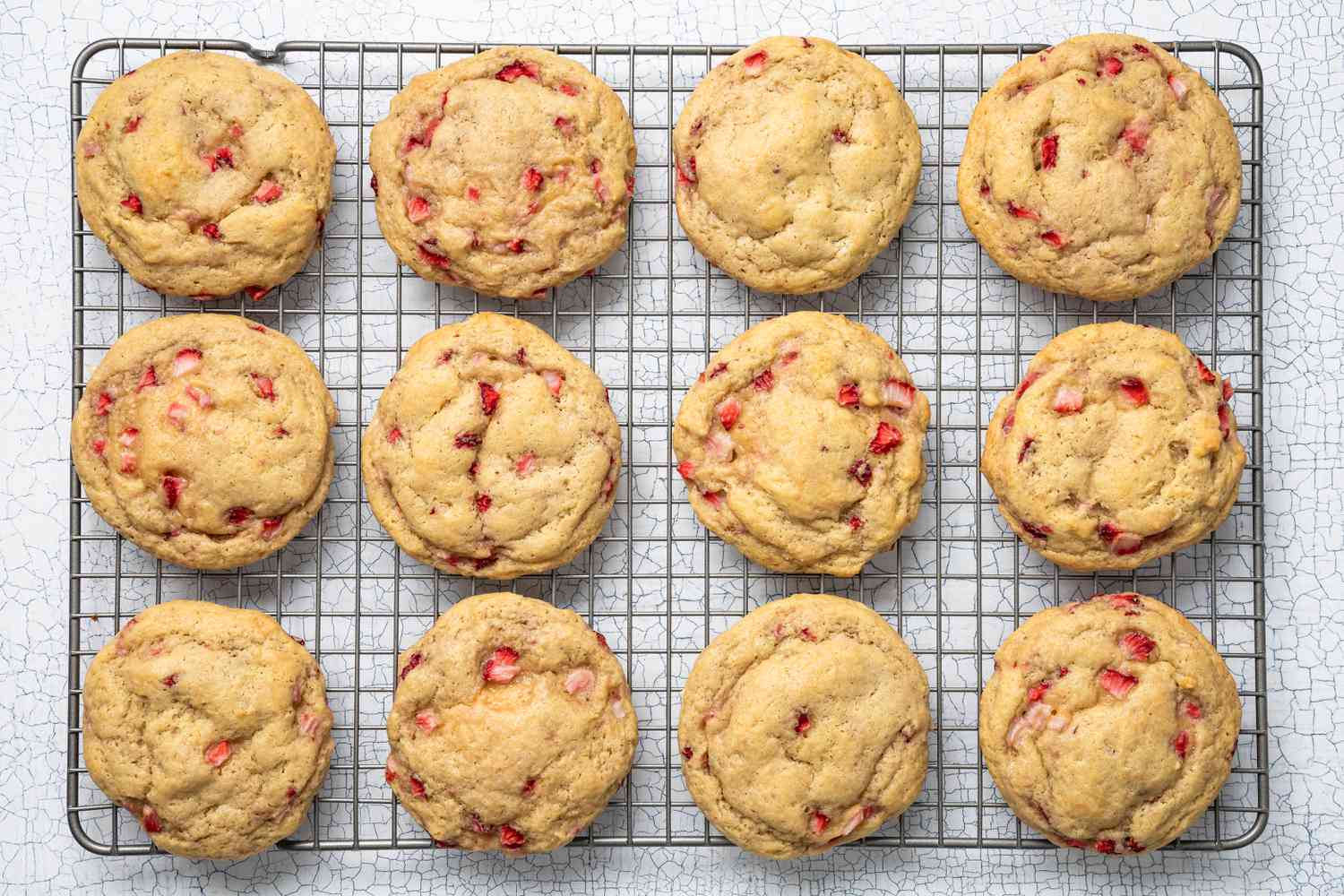 Strawberry Cheesecake Cookies on a Cooling Rack