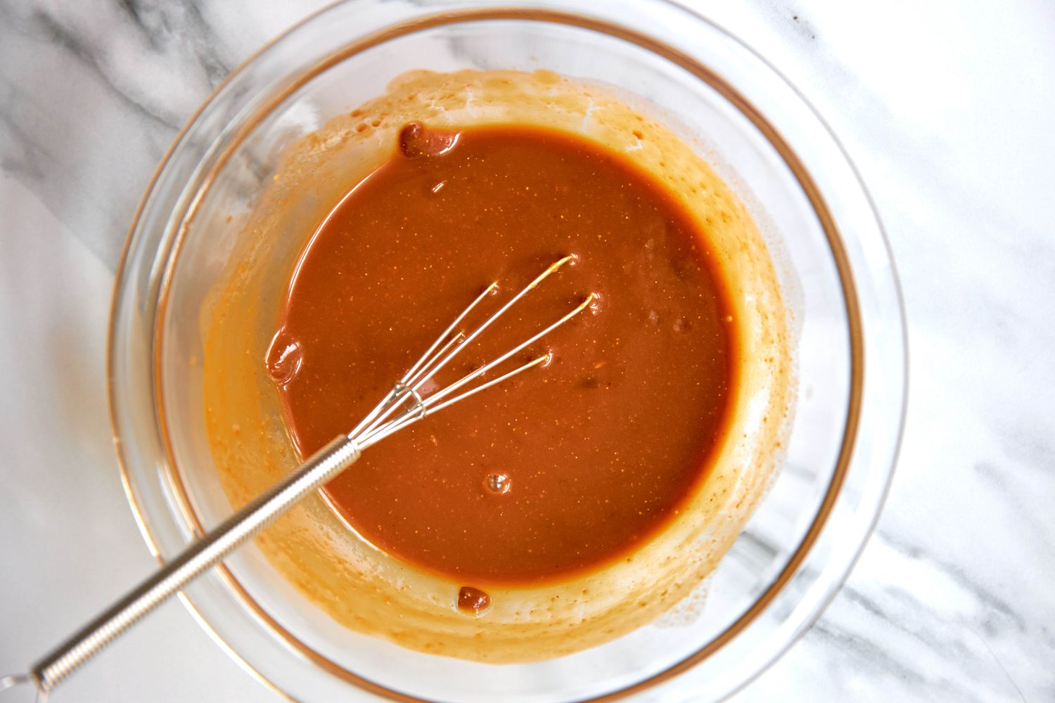 In a Bowl, Deonjang Paste Whisked Into the Reserved Broth