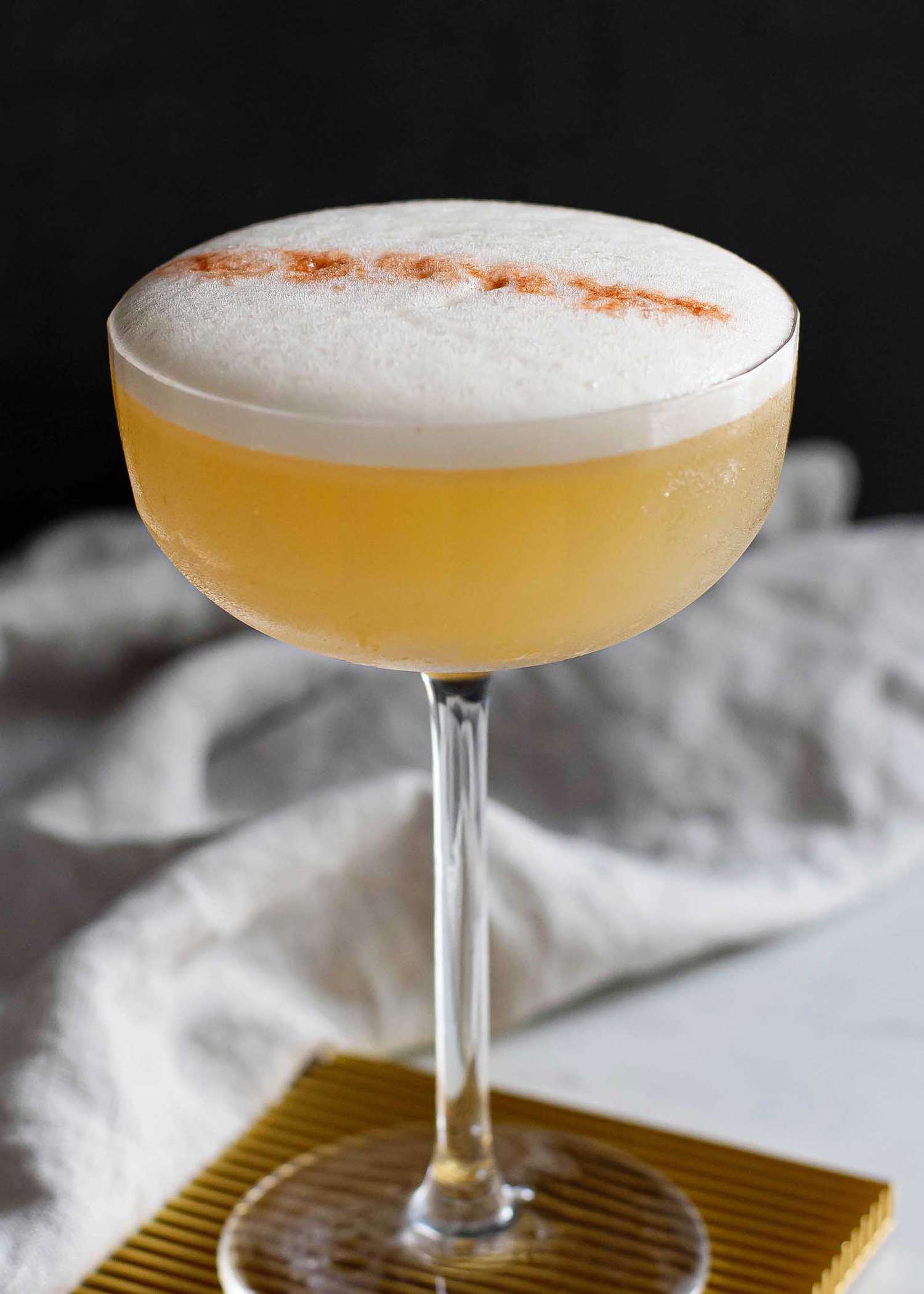 whiskey sour ingredients with an egg white