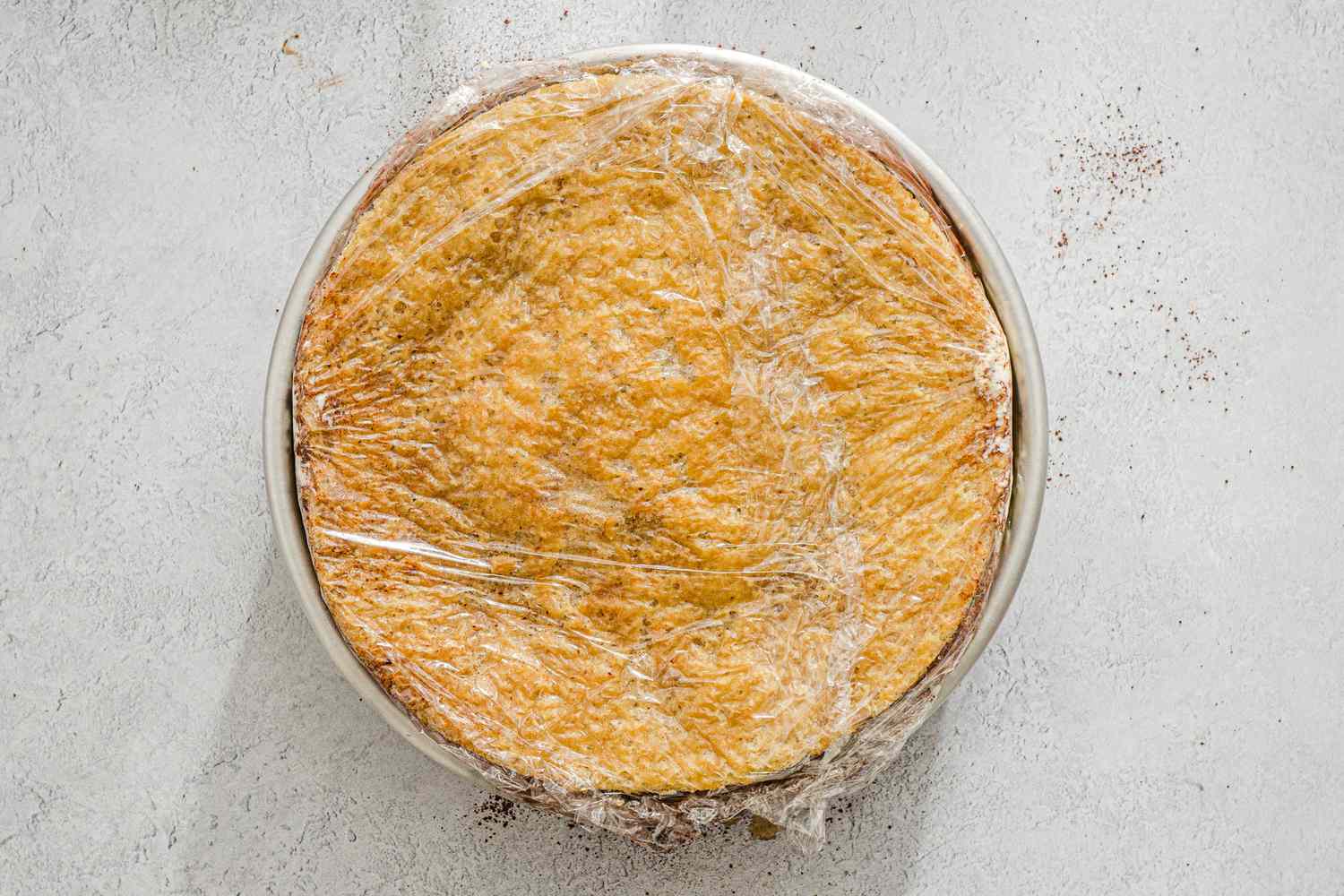 Add layer of cake and wrap with plastic wrap.