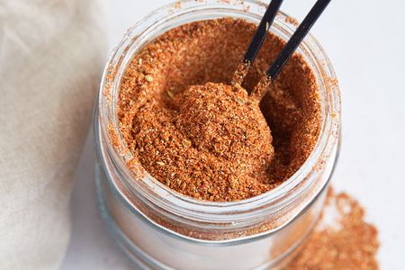 A tablespoon in a jar of homemade cajun seasoning