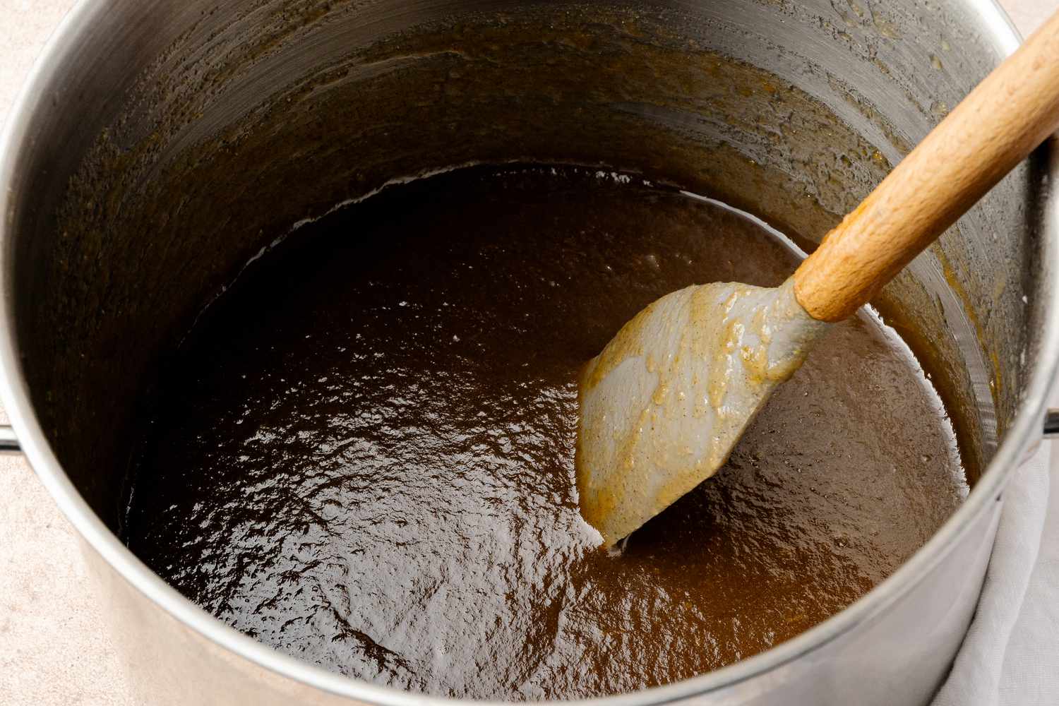 A Spatula in a Pot of Apple Butter Slow Cooker 