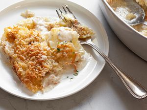 Au Gratin Potatoes on a Plate with a Fork