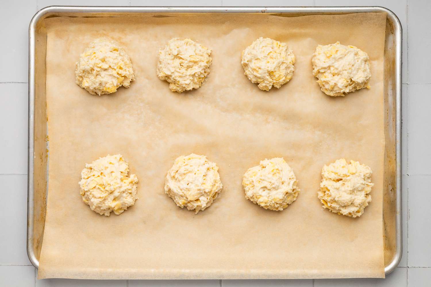 Drop biscuits on a parchment paper-lined baking tray