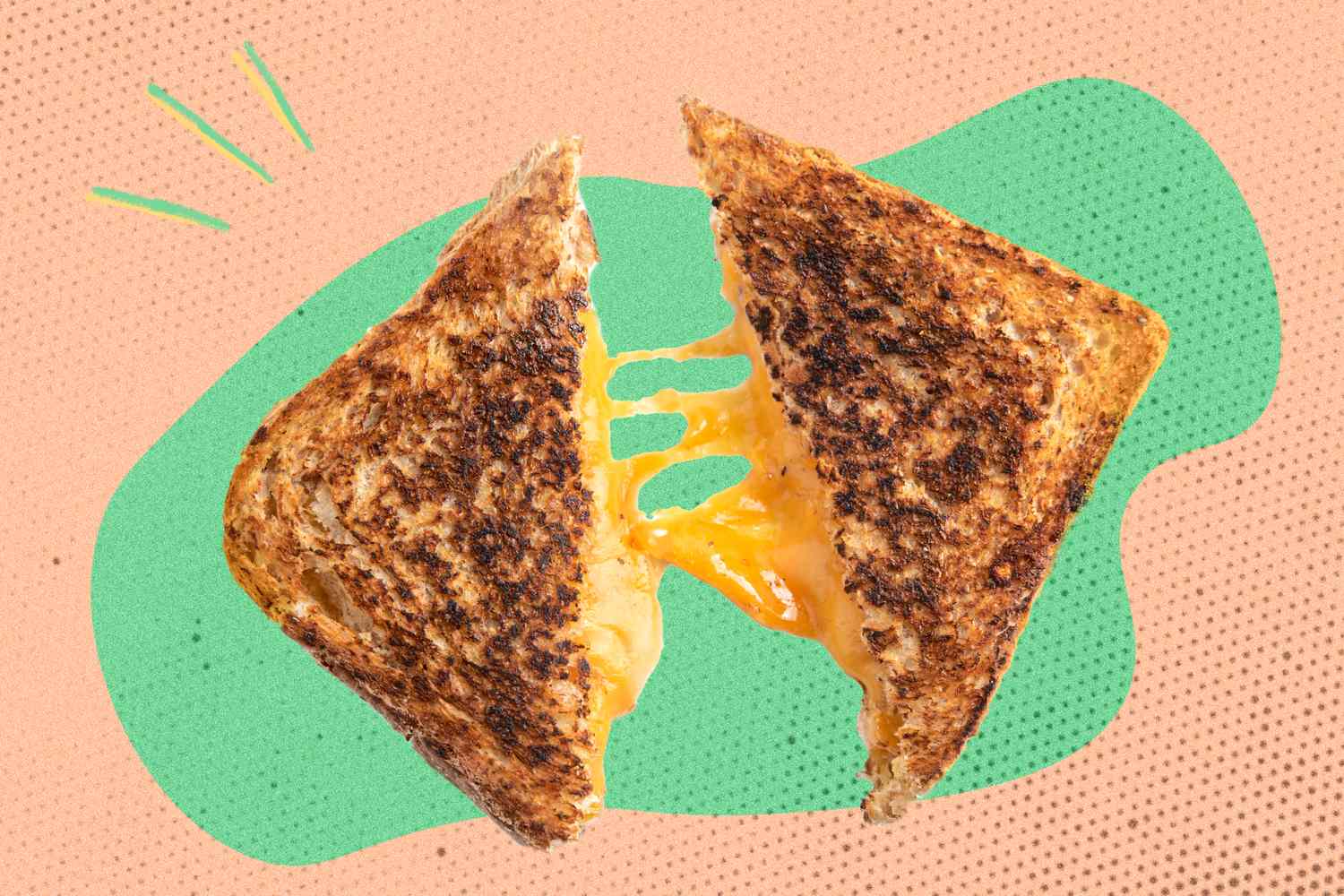 A grilled cheese sandwich cut in half with melted cheese stretching between the halves