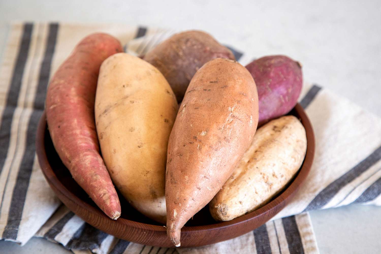 Sweet potatoes in a brown bowl