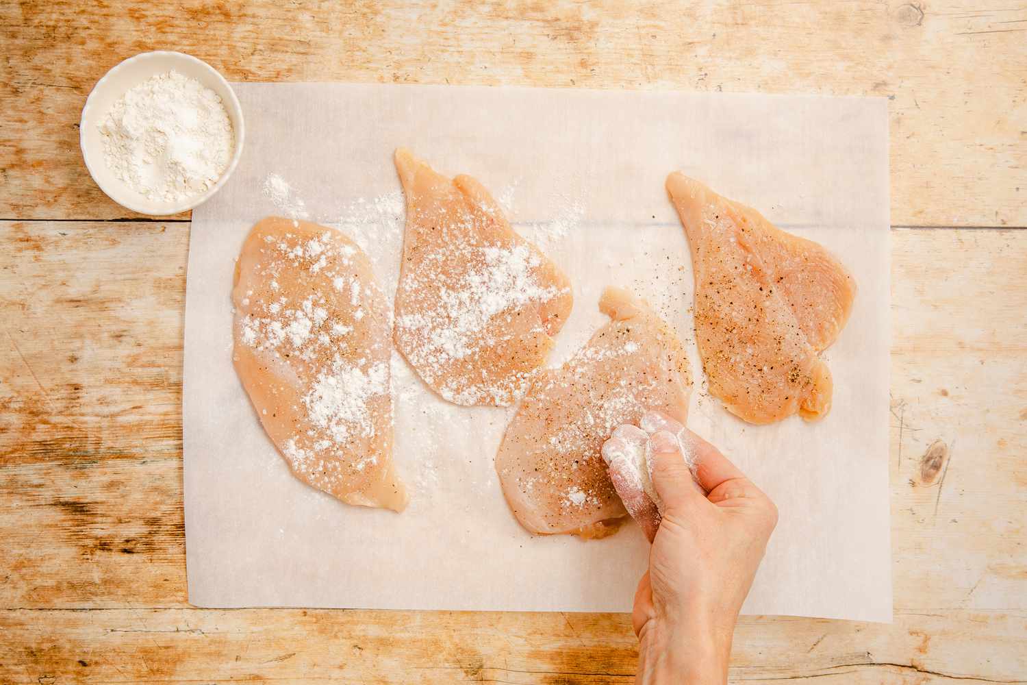 chicken seasoned and dredged in flour for chicken marsala recipe