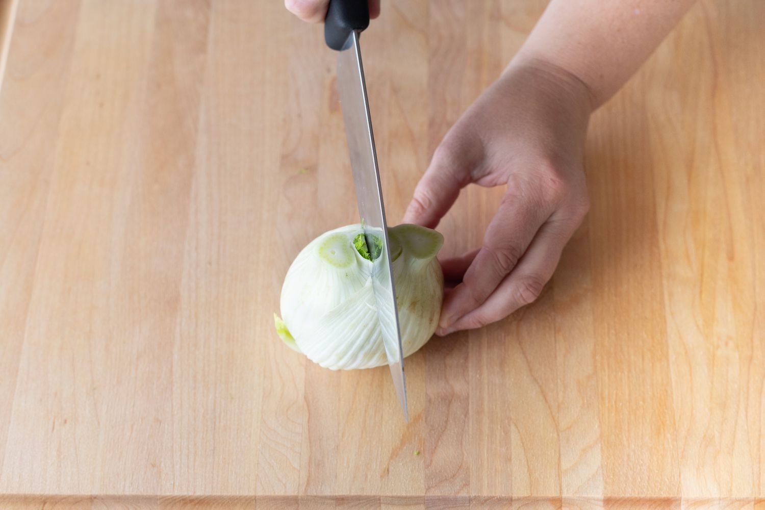 Cut the fennel bulb in half