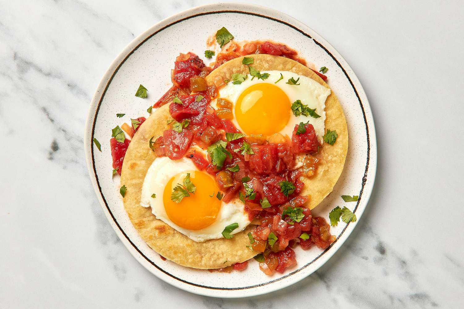 Huevos Rancheros Topped With Chopped Cilantro