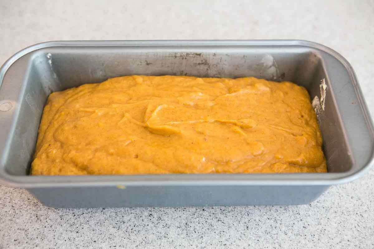 Easy Pumpkin Bread Pumpkin bread batter in loaf pan ready for the oven