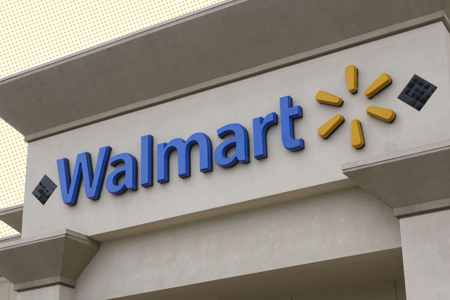 Exterior view of a Walmart store with its logo and signage visible on the building