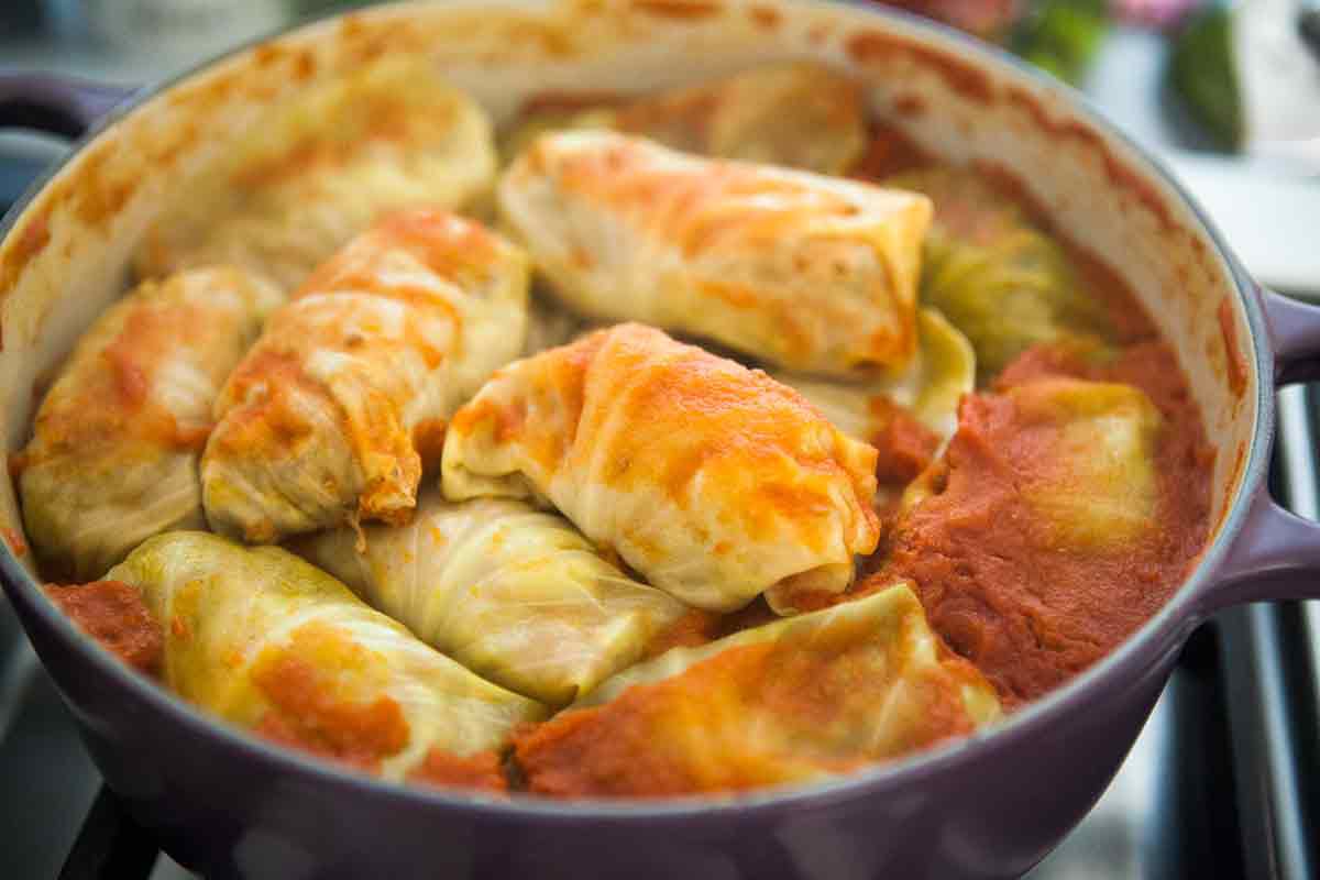 simmer stuffed cabbage rolls for an hour or until done