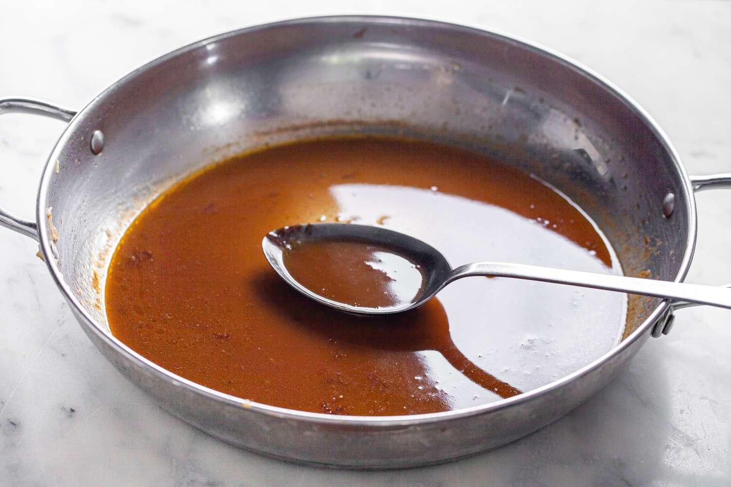 Vegetable Juices Simmered in a Pan to Make a Glaze