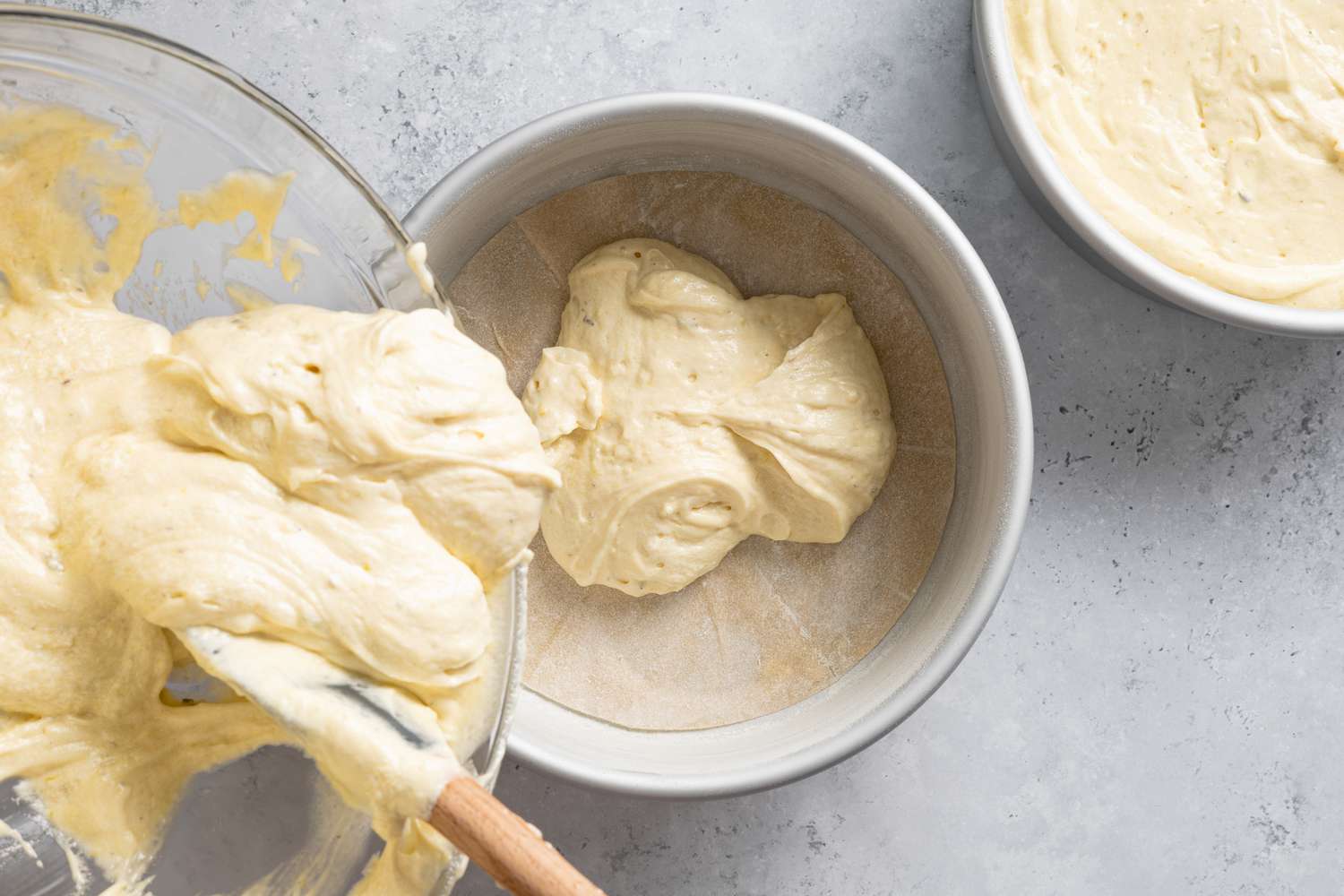 Pouring Cake Batter from Bowl to Cake Tin for Lemon Lavender Cake Recipe
