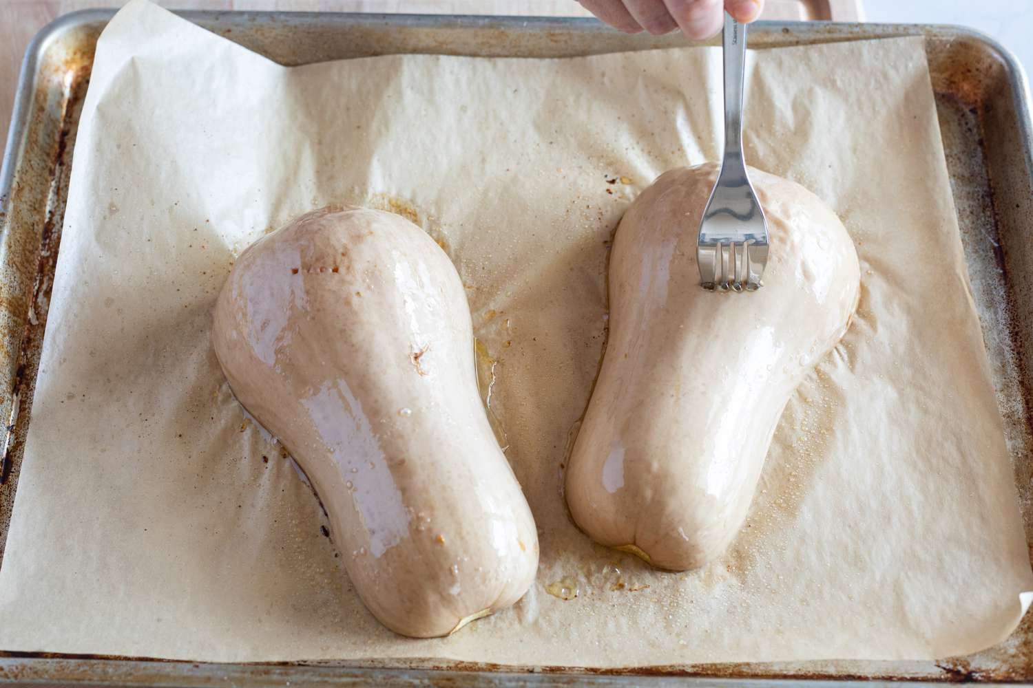 Prick a butternut squash with a fork to see if it's tender