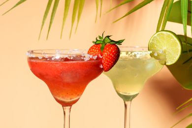 Strawberry and lime margaritas in margarita glasses