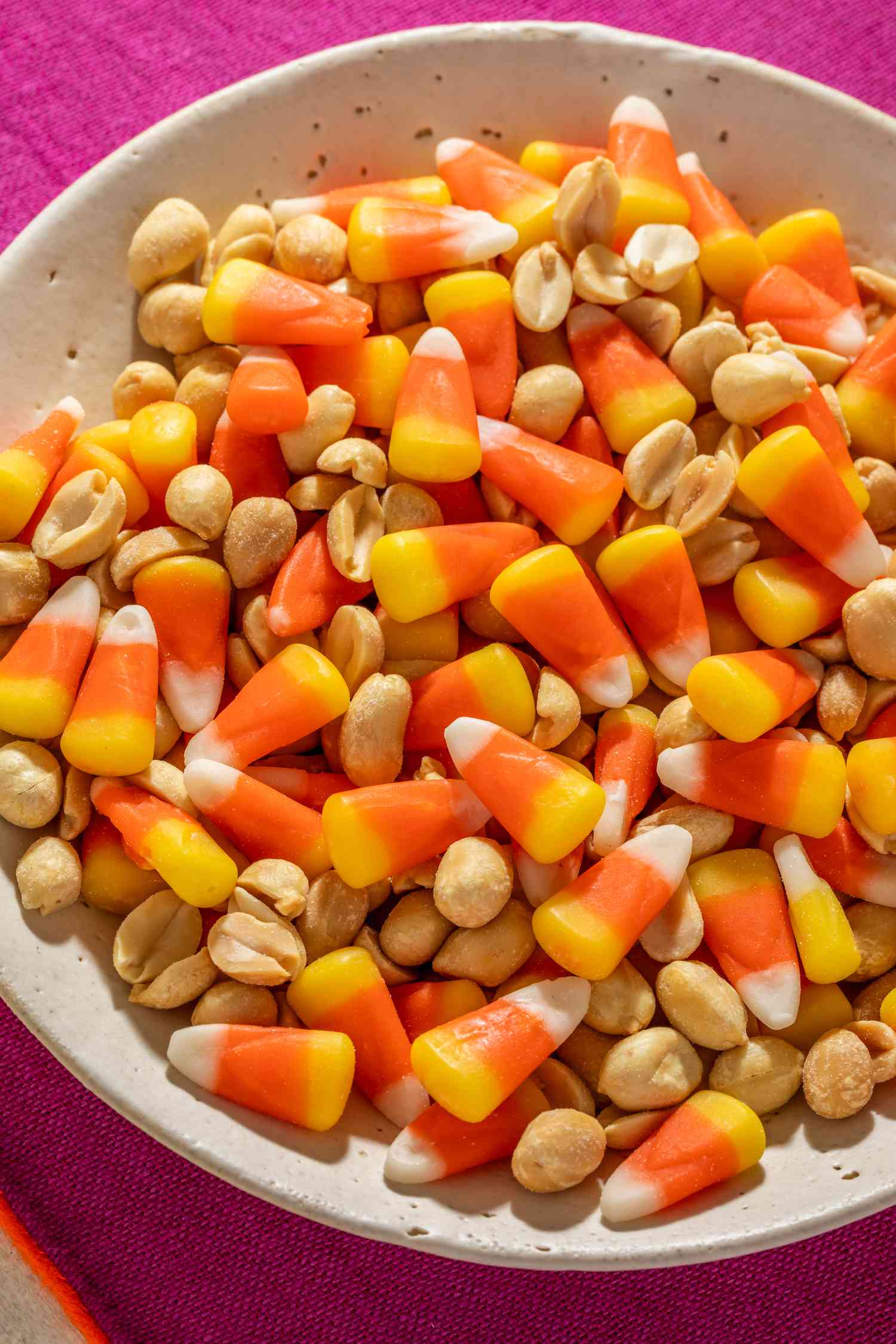 Bowl of candy corn and peanuts 