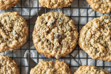 Overhead view of Oatmeal Raisin Cookies cooling on a rack.