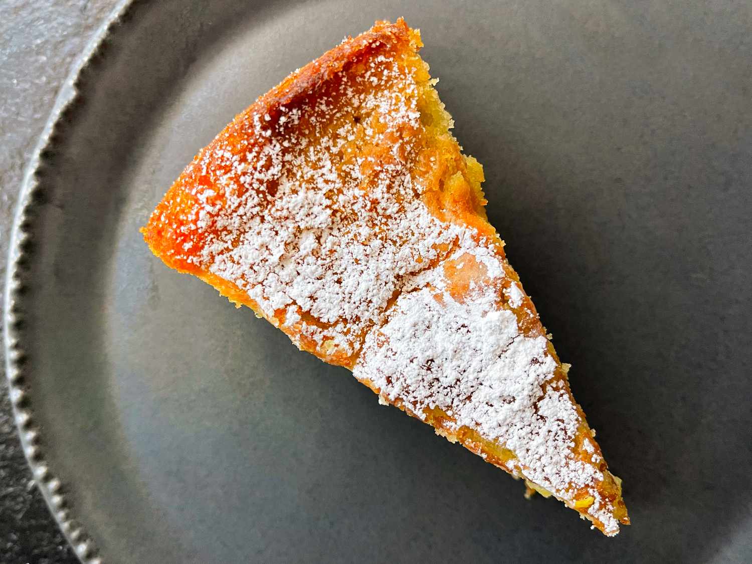 slice of olive oil cake on a plate