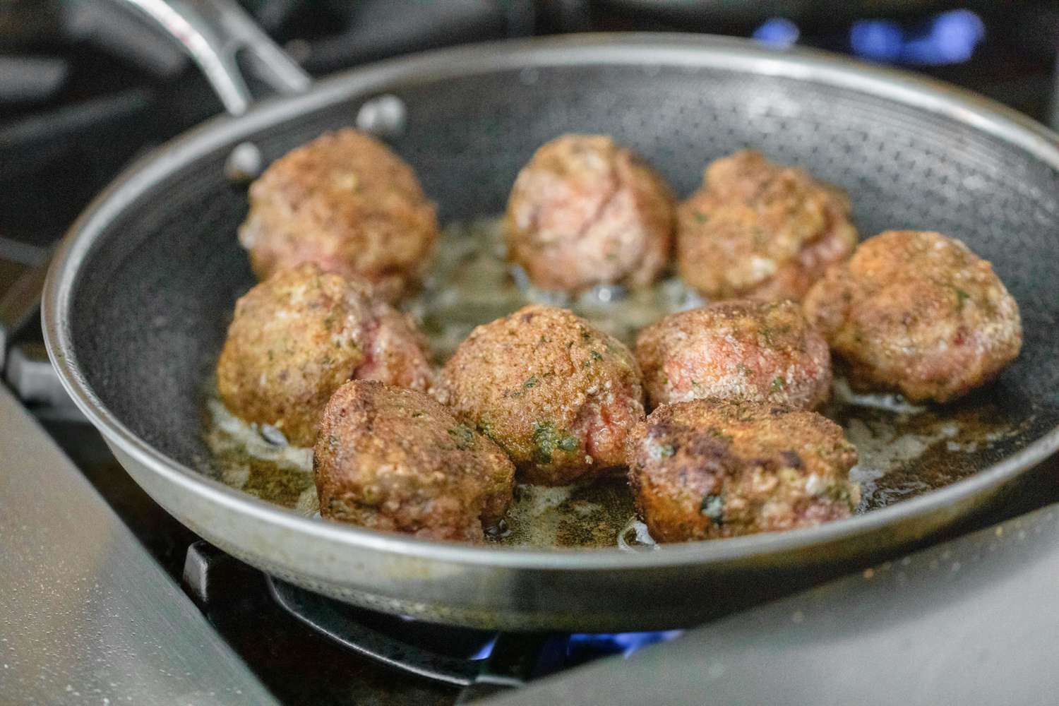 Meatballs Searing in a Skillet for Meatballs Sub Recipe