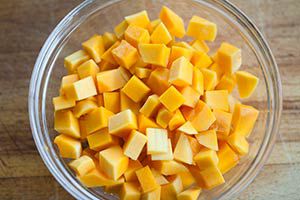 Cut and prepped cubes of butternut squash in a bowl