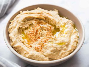 Best homemade hummus in a white bowl