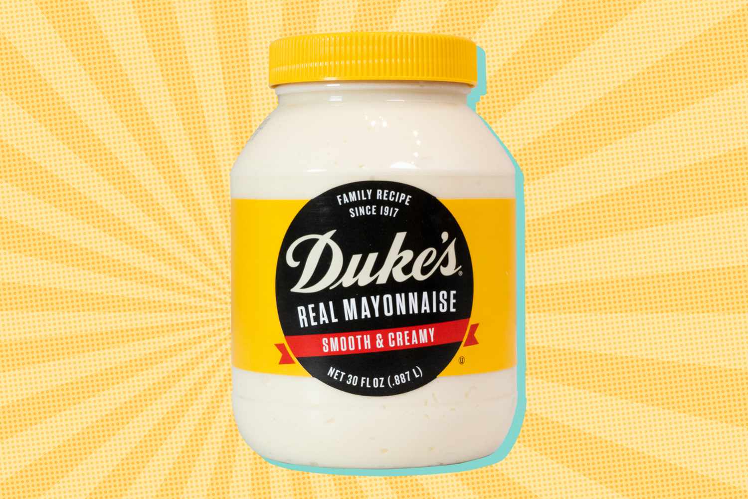 A jar of Duke's Mayonnaise on a yellow background