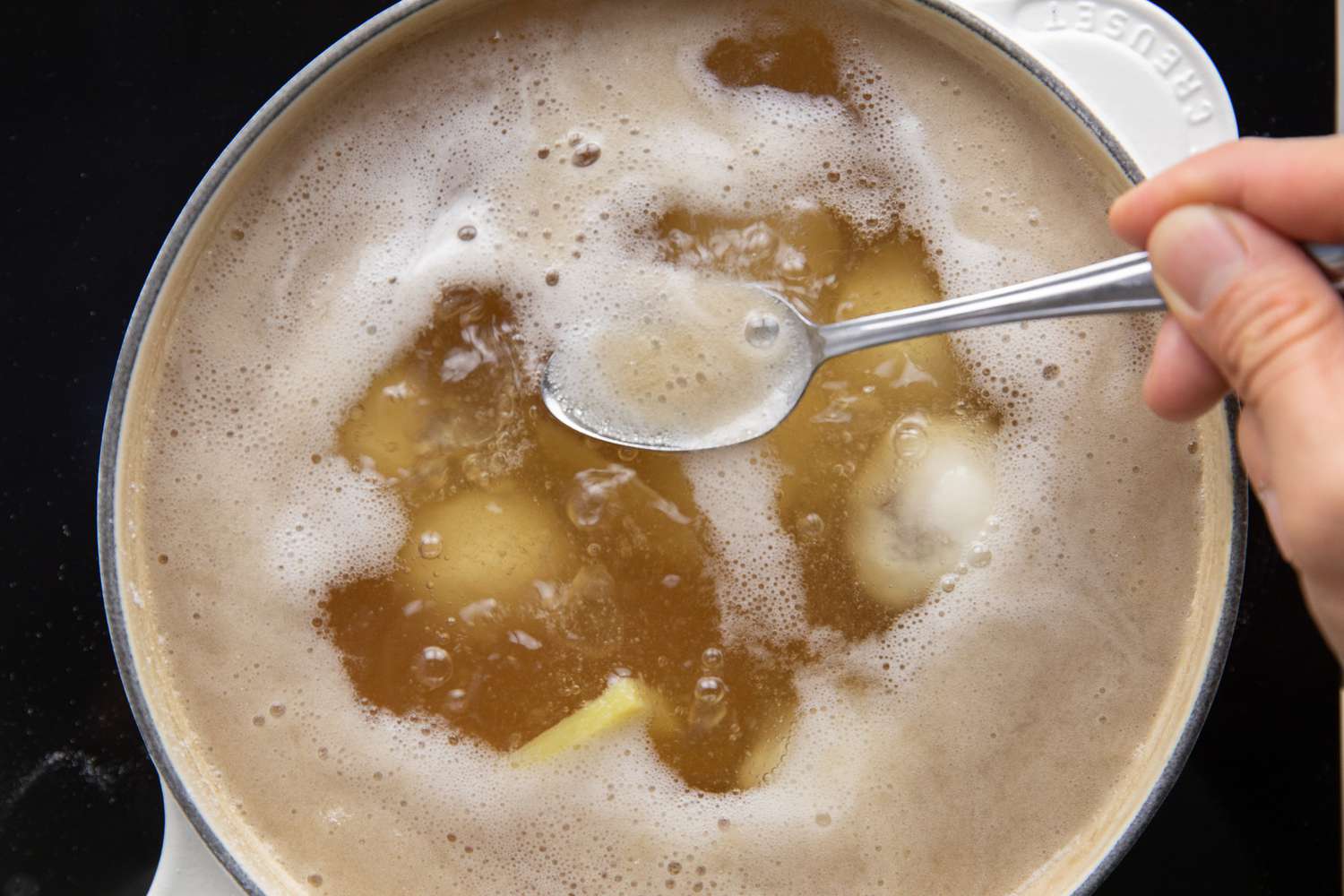 Spoon Used to Skim Off Foam from Red Bean Tangyuan 