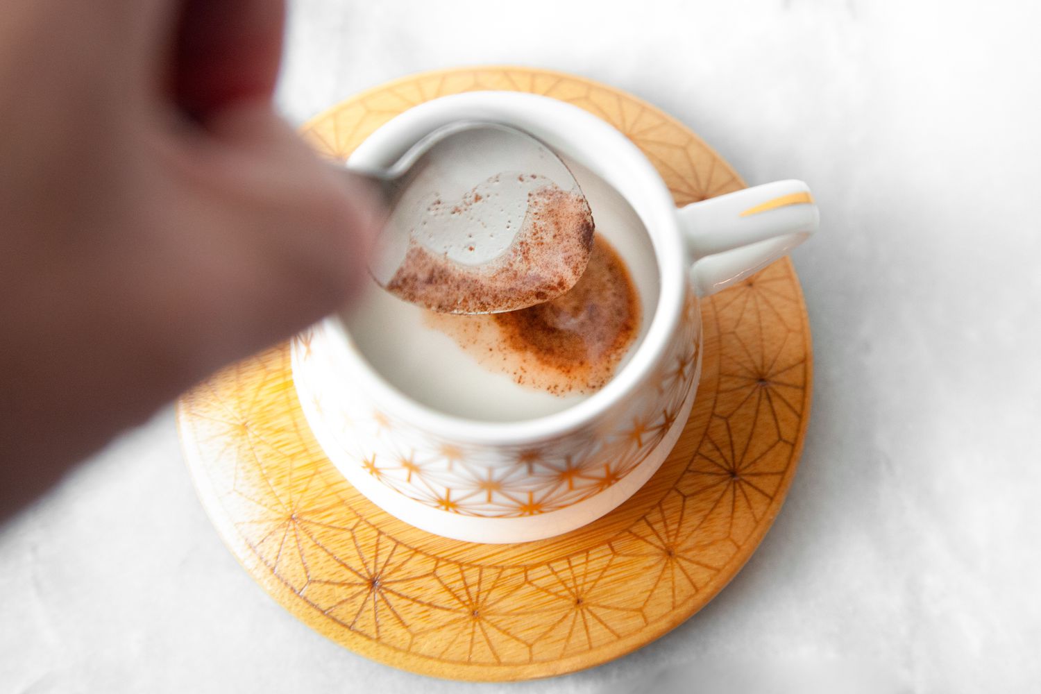 Foam Spooned into a Cup 
