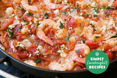 Shrimp in a tomato-based sauce with herbs, skillet-style weeknight recipe featured on Simply Recipes