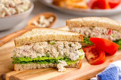 Chicken salad sandwich on a cutting board