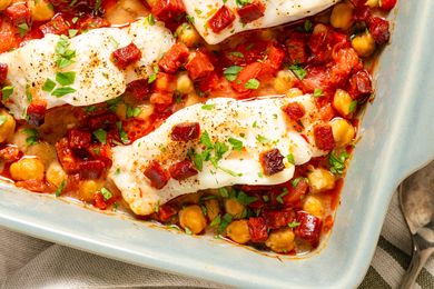 Baked cod with chickpeas tomato sauce and chorizo