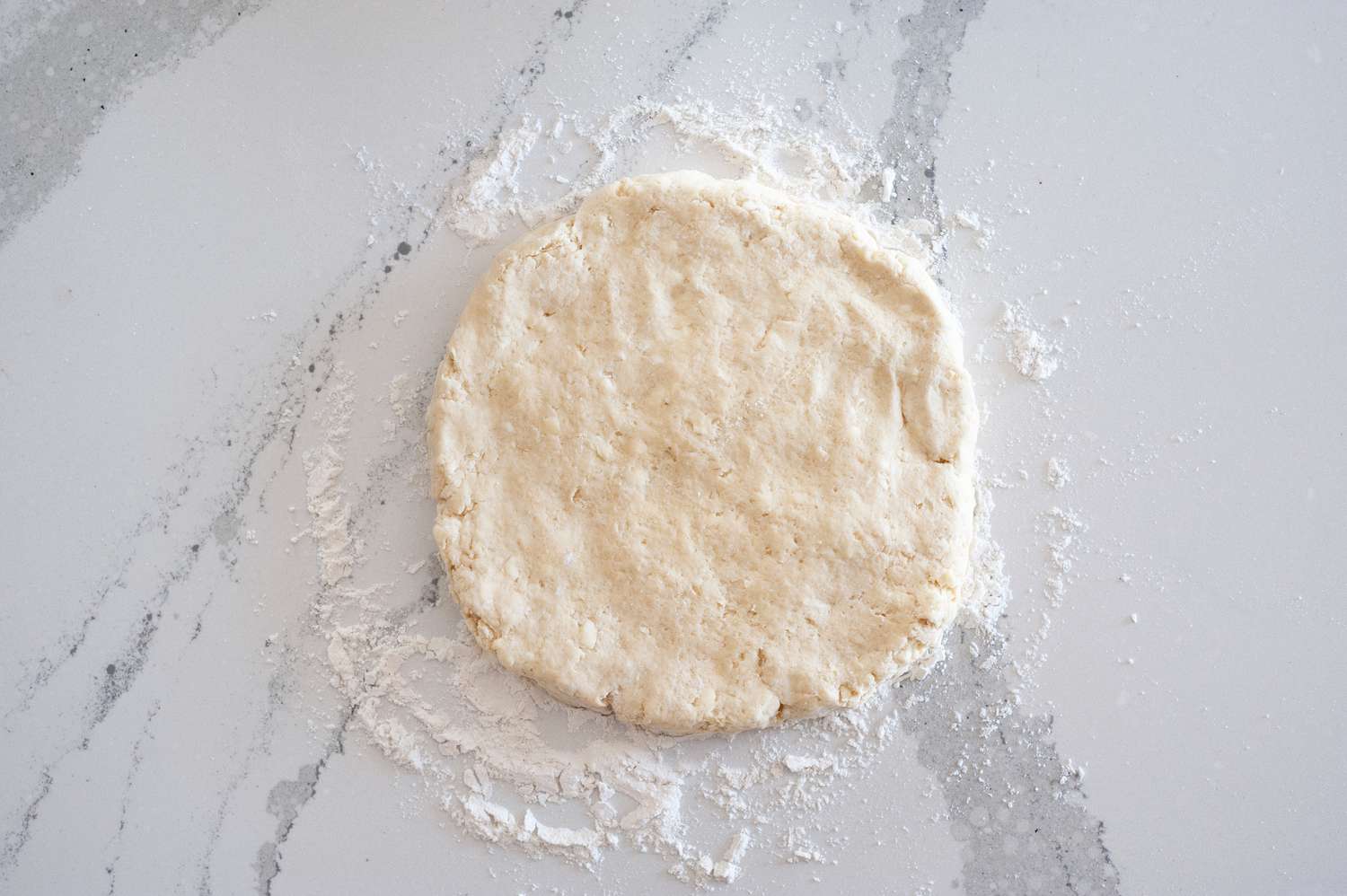 The Best Basic Scone Recipe rolled out on a floured surface.